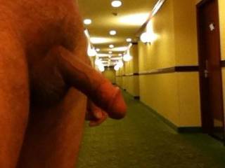 If I saw you in the hallway like that I would come out of my room and kneel down in front of that hot hard cock and suck you off right there in the hallway.  Do you think we would get caught?  K