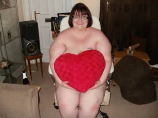 tease shot with heart shaped cushion