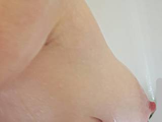 milk filled tits cleaning up in the shower