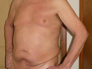 Naked with a hard cock.
