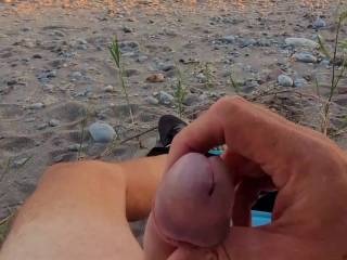 Jerking off at the public beach on Lake Ontario at sunset!! Tasty!! 😋