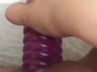 She uses her ribbed vibrator and fingers to bring herself to a powerful orgasm.