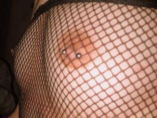 side shot of my titties in fishnet
