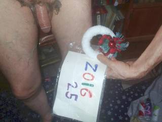 A standing looking down partial lower body view with a very messy colored lubed hair & skin... A TG1 camera was used.