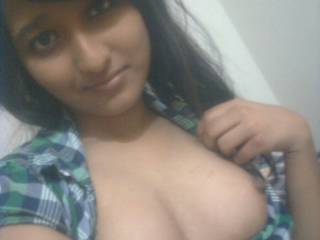 Opening my shirt to expose my tits :P