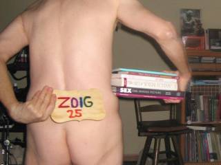 A partial body view that includes my butt as I stand holding my adult books... 1 of 3 Canon S70 camera`s was used.