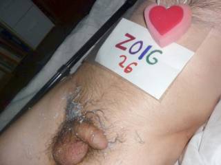 A frontal of my dick, balls and lube on my skin as I lay upon my recliner... A Z50 camera was used.