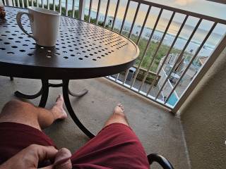 Hubby with his morning coffee at Panama City Beach.