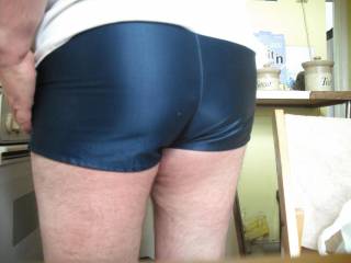 My ass cheeks and crack filling out my silky blue football shorts