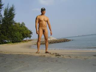 Sun tan in the nude by the beach, do you want to join me?