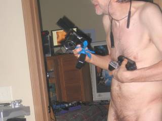 I partial body frontal as I stand near my bed room door and holding various camera`s...September 2025. 1 of 3 S70 camera`s was used.
