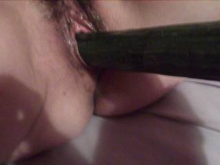 Having a big cucumber push up my pussy. mmmm