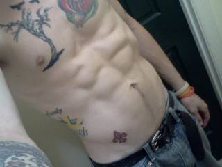 Tattoos and abs for yall