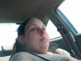Driving around town with my tit hanging out
