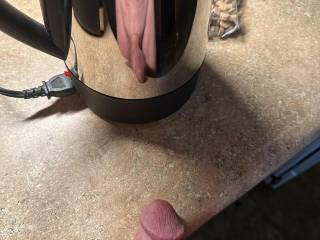 Making the morning coffee.