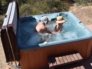 Enjoying ( read having orgasms) the hot tub's main jet stimulate my clit as hubby fingers my ass and squeezes my nipple.  I have a huge orgasm about this time!