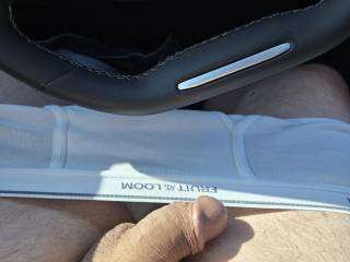 Sitting in my car in the mall parking lot.