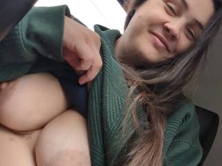 Driving around showing off some titties!