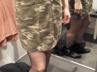 The camo dress fitted nicely across her arse.. up goes the zip!