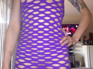 Beautiful wife showing her purple dress to me