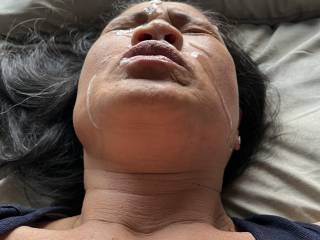 Watching the cum drip down her face