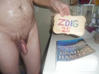 A frontal view of my lubed dick after some toy play as I stand near my bathroom sink. Z50 camera was used.