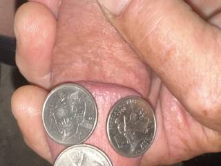 Three US quarters on my flaccid dick head. Quarters are 15/16” dia