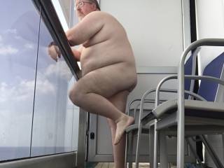 My wife and I took our very first cruise. I loved being out on the balcony naked.