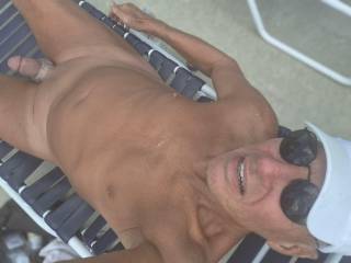 Naked by the pool.