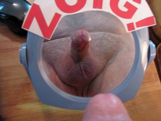 Vain cock staring into a mirror.