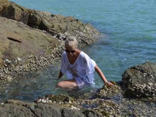 she was very wet, not from the water, and from desire