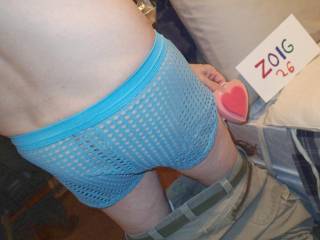 I am wearing my mesh undie as I stand near my bed... you can barely see my butt crack. TG1 camera was used.