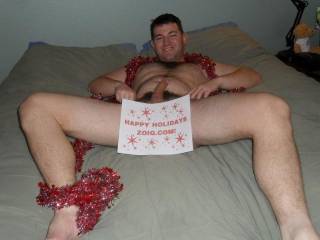 Eagerly waiting for Chix2 to finish tinsel tying me.  Could you help me escape my flashy bonds?