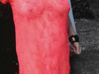 Here is Sally out in public wearing her 'Flamingo' dress. I am sure that you will have noticed that it is a little sheer!  Oh and notice her wrist cuffs for later playtime!