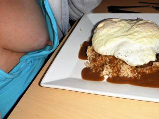 This dish is called a Loco Moco, which is a popular dish in Hawaii.  Does this look tasty to you?  Would you like a bite?
