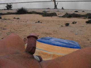 at the nudist beach wearing a really tight cockring