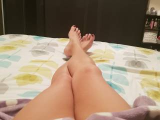 Sitting around all day with no undies on... I think My feet and my legs I think are my best features!!