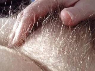 Wife stroking her soft bush