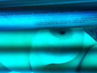 Wife in tanning bed