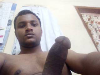 A teen boy alone home with a fully erect dick in hand