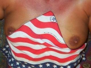 Nothing better than a nice set of tits to go with our flag!!!  Any comments and votes or similar pics???