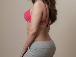 Pink bra and gray flare pants