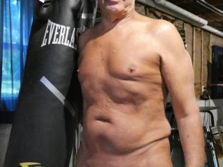 Working out in the nude with my punch bag.