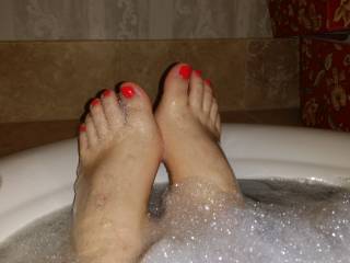 My pretty painted toenails in the bathtub.