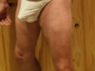 My cock is stirring in my white thong.