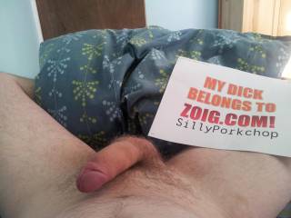 laying on my bed with my cock, balls, pillow and zoig sign out on the open