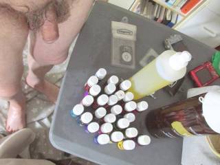 A looking down frontal as I stand near a portable table with my essential oils & massage lotion... I just created a new mix... in late April of 2025. Pictures taken with SX 160 camera.