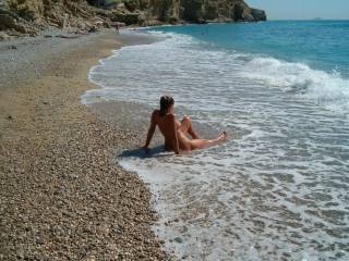 Love to sit near the edge of tide, as the water rushes up and lightly carresses my clit, oohps !!