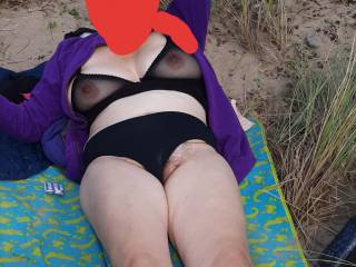 Pussy slip and seethrough bra on the beach.