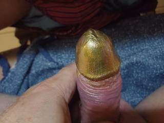 Gold painted cock head